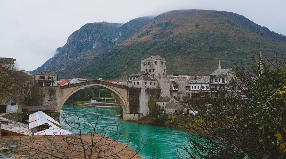 The old bridge over the turquoise Neretva river in Mostar, Bosnia and Herzegovina