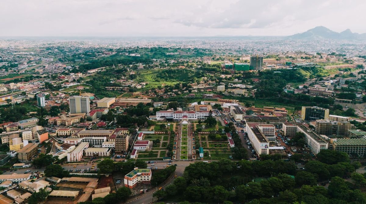 View over a green city and hills in Cameroon