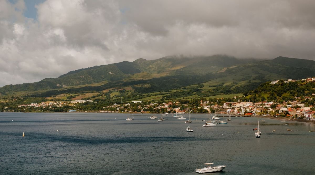 Green mountains above a calm bay in Dominica