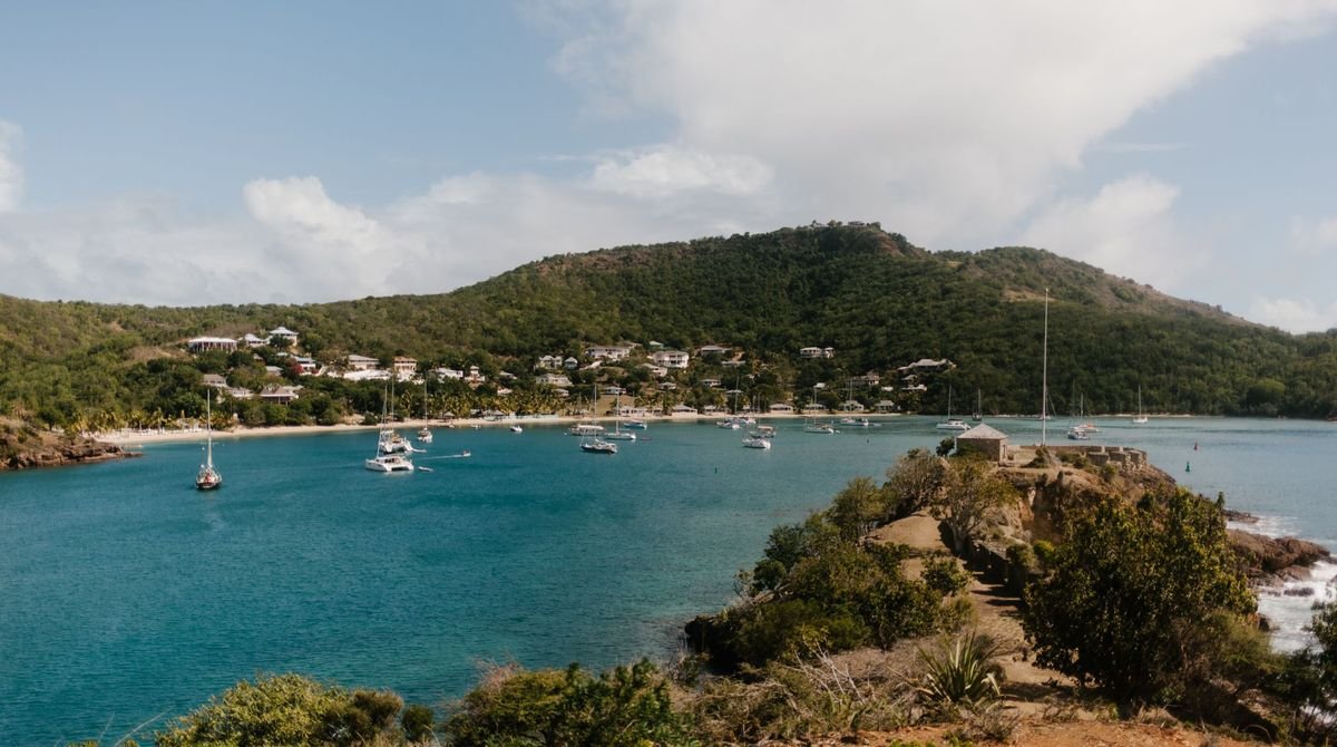 Green hills around a Caribbean bay with moored boats