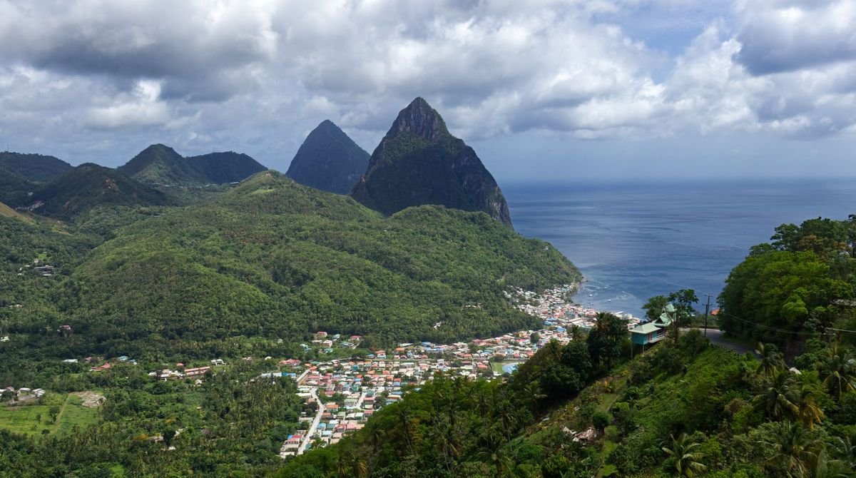 The Pitons rising above the sea near Soufriere, Saint Lucia