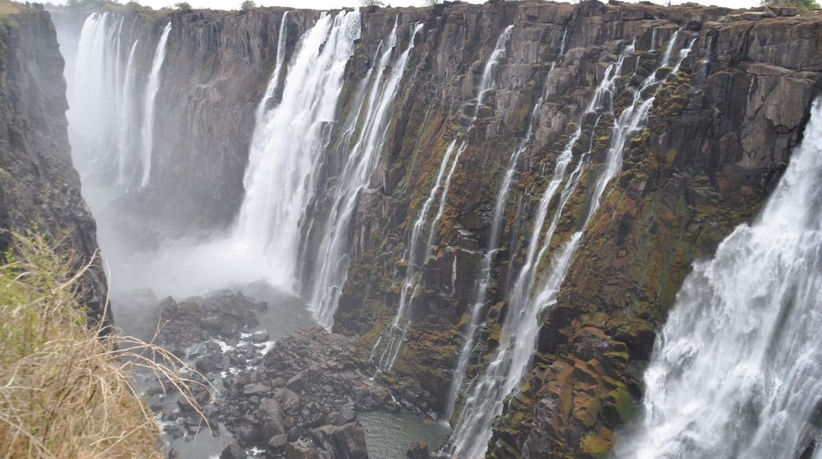 Victoria Falls dropping into the gorge, seen from Zambia